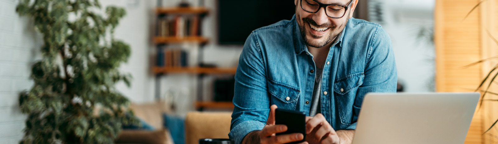 a man looking at his mobile phone