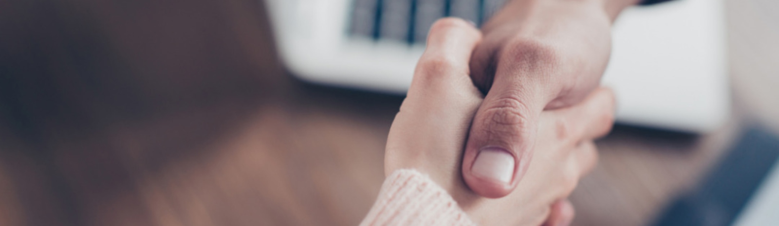 two people shaking hands