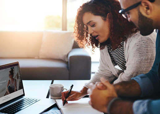 Young couple working on finances